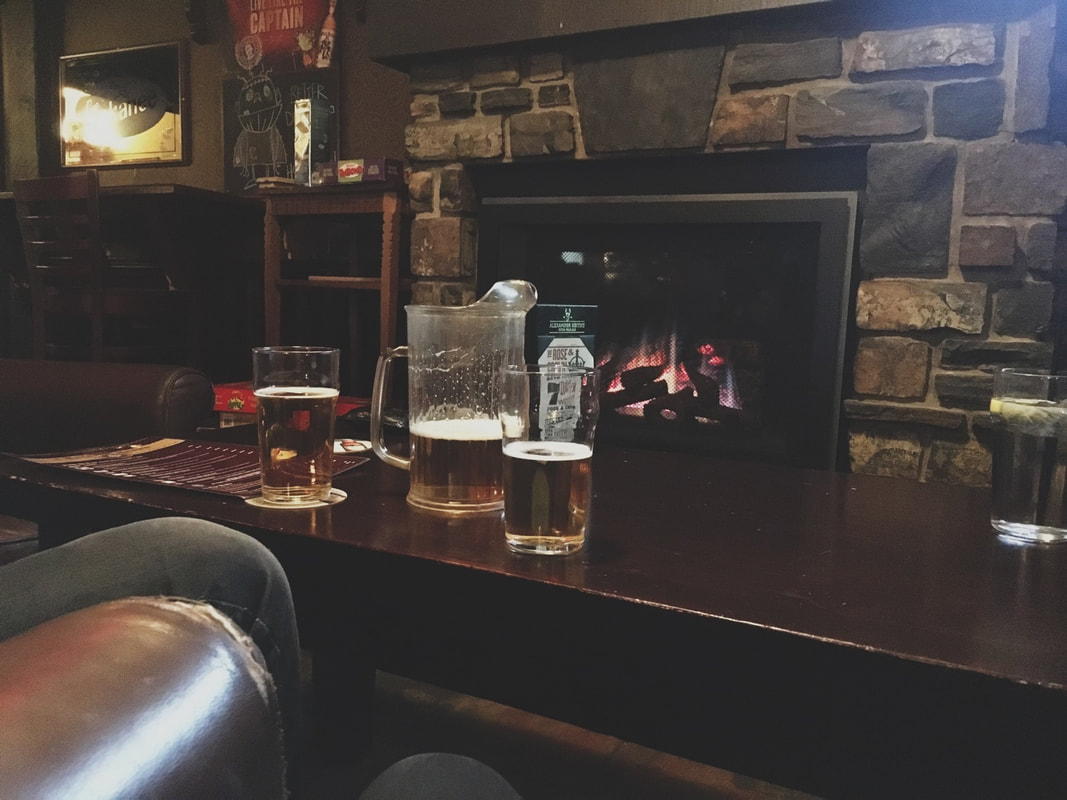 Sustainable Travel: Sharing a Pitcher of Beer in Front of the Fire